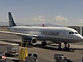 A Mexicana A320 parked at T1. [2006]