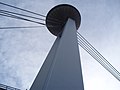 Close-up of the bridge's pylon and the "flying saucer" from below