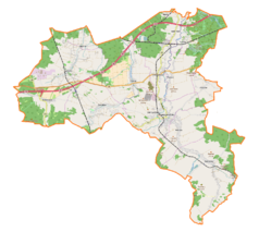 Mapa konturowa gminy Nowogrodziec, blisko centrum na prawo znajduje się punkt z opisem „Nowogrodziec”