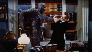 The Mummy (1959) trailer - Christopher Lee & Peter Cushing.png