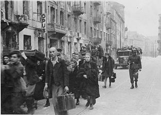 NARA copy #31 To the transhipping place Column heading North to Umschlagplatz on Zamenhofa Street near Kupiecka. In the back buildings of Zamenhofa 30-40 block.