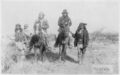 Image 12"Geronimo's camp before surrender to General Crook, March 27, 1886: Geronimo and Natches mounted; Geronimo's son (Perico) standing at his side holding baby." By C. S. Fly. (from Photojournalism)