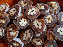 Gotgam-ssam (dried persimmon rolls) made with walnuts