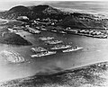 Balboa harbor on 25 October 1934. Fleet moored include two battleships at dock, three cruisers, tenders Whitney and Dobbin, with more than 40 destroyers, noted are McFarland, Goff, and Long