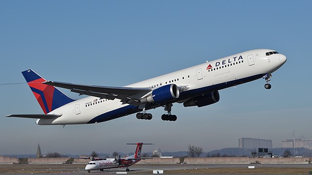 Delta Air Lines Boeing 767 taking off at Stuttgart Airport.