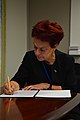 A representative of the Library of the University of Tartu museum signing the manifesto