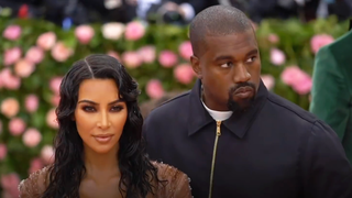 Kim Kardashian and Kanye West at the Met Gala in 2019.png