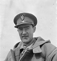 Head-and-shoulders photograph of a man in military uniform with an SAS peaked cap