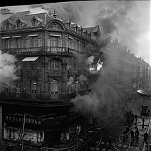 Photographie de l'incendie d'un magasin