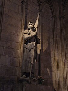 Statue of Joan of Arc in Notre-Dame de Paris cathedral interior