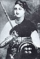 Rani Lakshmibai, Rani di Jhansi, una dei principali capi dei moti indiani del 1857, che precedentemente aveva perso il proprio regno come risultato della "dottrina della decadenza" inaugurata da James Broun-Ramsay, I marchese di Dalhousie