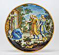 Piatto in maiolica dipinto con Abramo e i tre angeli. Ferdinando Maria Campani, San Quirico d'Orcia, metà del XVIII secolo.