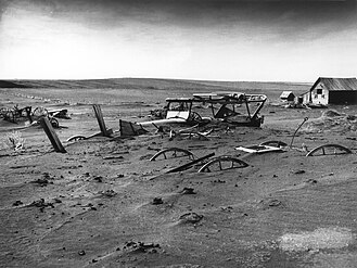 Vehicles and machines buried in dust (South Dakota, 1936)