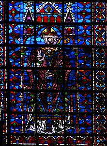 13th-century nave window representing a bishop