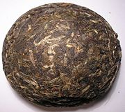 Green Pu-erh tuo cha, a type of compressed raw pu-erh