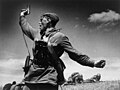 Image 9 Kombat Photograph credit: Max Alpert Kombat (Russian for 'battalion commander') is a black-and-white photograph by Soviet photographer Max Alpert. It depicts a Soviet military officer, armed with a TT pistol, raising his unit for an attack during World War II. This work is regarded as one of the most iconic Soviet World War II photographs, yet neither the date nor the subject is known with certainty. According to the most widely accepted version, it depicts junior politruk Aleksei Gordeyevich Yeryomenko, minutes before his death on 12 July 1942, in Voroshilovgrad Oblast, now part of Ukraine. The photograph is in the archives of RIA Novosti, a Russian state-owned news agency. More selected pictures