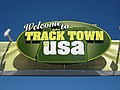 "Welcome to Track Town USA" sign