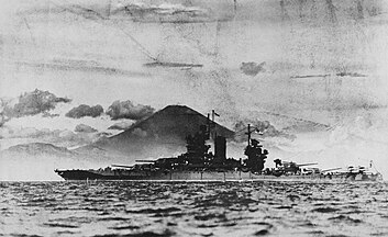 The battleship USS New Mexico anchored in Tokyo Bay with Mount Fuji in the background, August 1945