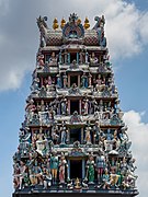 Gopuram monumental ornate tower at the entrance of Sri Mariamman Temple with sculptures of Hindu deities Chinatown Singapore.jpg