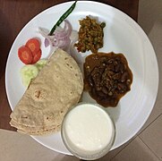 Chapati with Beans, Peas curry, Vegetable salad and Curd in Mumbai