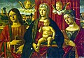 Madonna en kind met Johannes de Evangelist en een onbekende heilige