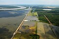 Aerial photograph of the first bay opening on the Morganza Floodway on 14 May 2011. The Mississippi River is in the upper left background, and the Atchafalaya Floodway to the right.