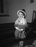 A girl wearing the Traditional Welsh costume for St Davids Day in Barmouth, 1960