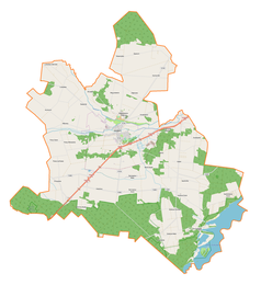 Mapa konturowa gminy Wolbórz, blisko centrum na lewo u góry znajduje się punkt z opisem „Świątniki”