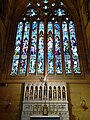 Chapel of Our Lady with stained glass windows above, the reredos features statues of influential female saints