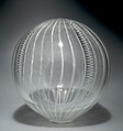 Example of canework in blown glass sculpture. This large sphere incorporates both ballotini and zanfirico cane in a work by David Patchen, an American artist working almost exclusively in these techniques.