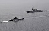 INS Kulish, left, passes USS Halsey during Malabar 2012.