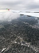 Un A330neo de TAP Air Portugal au-dessus de la banlieue de Chicago.