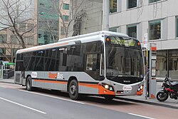 Transdev Melbourne Custom Coaches bodied MAN 18.310 on Lonsdale Street in August 2013