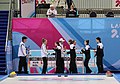 Handshake of Team Russia and Team New Zealand while their coaches watch it from above