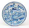 Piatto dipinto con un "Mangiamaccheroni", Maiolica di Laterza, ultimo quarto del XVII secolo