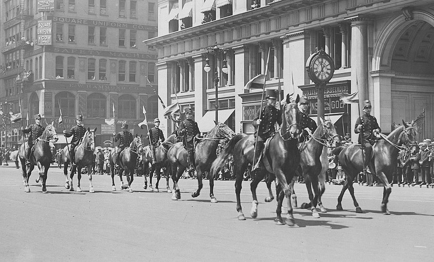 Black-and-white photograph of Venezuelan lancer cavalry marching down Fifth Avenue in New York City during its July 1918 parade