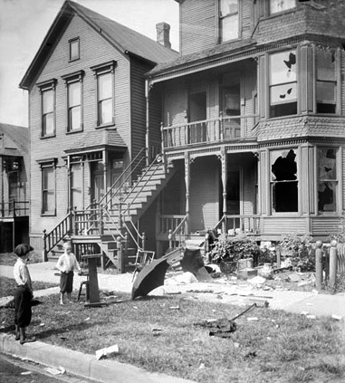 File:Chicago race riot, house with broken windows and debris in front yard.jpg