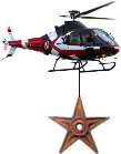 Barnstar hanging from helicopter.png