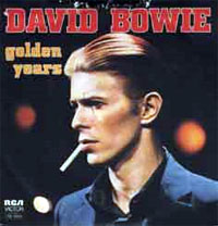 A close-up of a younger man with slicked back red hair holding a cigarette in his mouth looking to the left. "DAVID BOWIE" appears above him in big red letters with "golden years" in all lowercase to his left