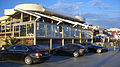 Cars outside a restaurant on the Dinevi Marina