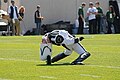 A Michigan State drum major performs a backbend