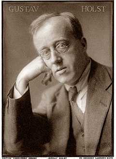 middle-aged man in head and shoulder shot looking at camera