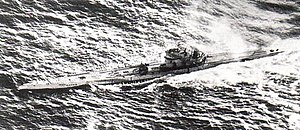 A Type IXB submarine, believed to be U-106, under attack by a Sunderland flying boat