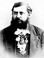 Пуковник Владан Ђ. Ђорђевић (1844-1930), са српским орденом „Таковског крста“ око врата.