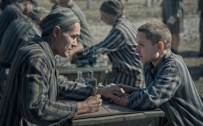 THE TATTOOIST OF AUSCHWITZ -- Episode 101 -- Pictured: (l-r) Jonah Hauer-King as Lali, Anna Próchniak as Gita -- (Photo by: Martin Mlaka/Sky UK)