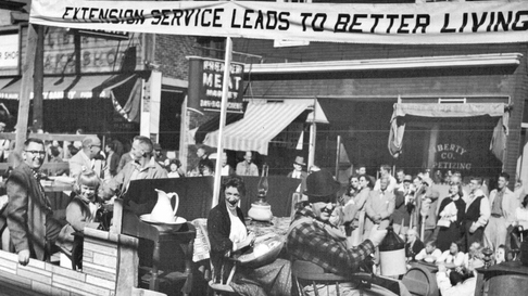 A parade float with a banner 