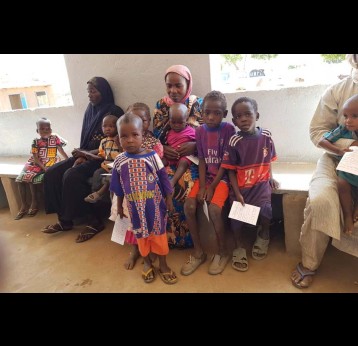 Children with their vaccination cards during a vaccination campaign against meningitis A in Chad. Credit: Gavi/2018