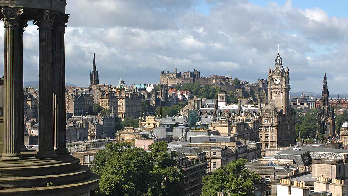 Edinburgh city skyline seen from Calton Hill on a cloudy day