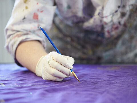 Student working with fabric