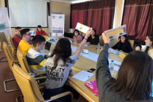 Participants of Model OSCE from Tajikistan during a practical exercise on diplomatic negotiations, Varzob, Tajikistan, 12 December 2020.  (OSCE/Nigina Abdullaeva)